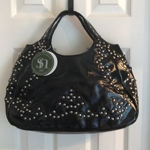 Susan Nichole began leather handbag
